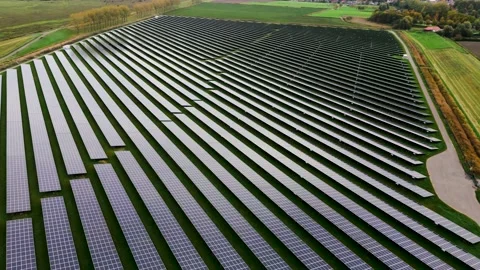 Aerial view of Solar panel farm or solar power plant. Renewable energy. Stock Footage 220102784