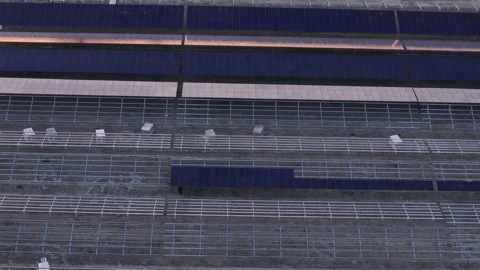 Aerial view of solar panel farm construction and mounting process Stock Footage 332781853