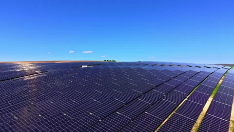 Aerial view of solar panel field under blue sky, Bulgaria 스톡 동영상 344690926