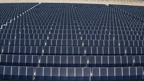 Aerial view of solar panel grid in clean energy field near Las Vegas Nevada Stock Footage 271280997