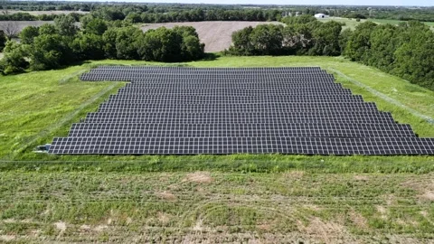 Aerial View Solar Panel Grid Array AI Green Energy Video stock 337006151
