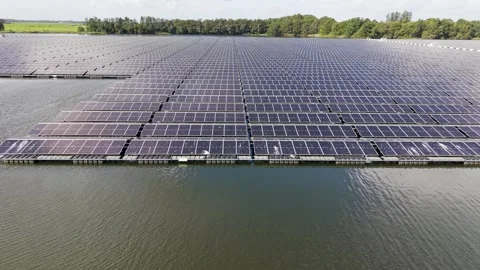 Aerial view of solar panel modules on water surface in Beilen, Netherlands 動画素材 346135752