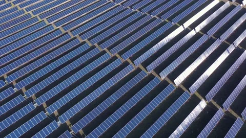 Aerial View of Solar Panel Rows in Renewable Energy Farm Stock Footage 329852926