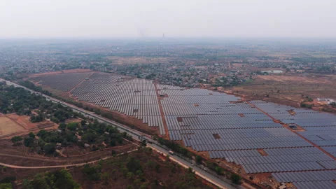 Aerial View of Solar Panel Rows and Renewable Energy Facility in India Stock Footage 334991940