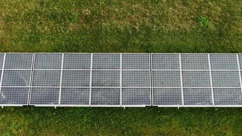 Aerial View of Solar Panel Rows in Green Meadow Germany Fotos Stock
