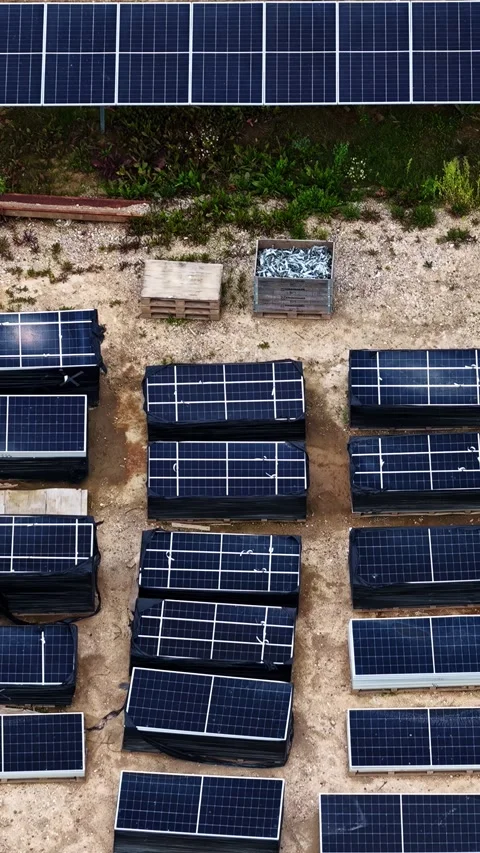 Aerial view of solar panel stacks on a construction site, Latvia. Stock Footage 344984100