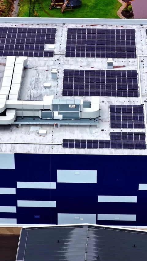 Aerial view of solar panels on a building roof in Latvia. Stock Footage 339807516