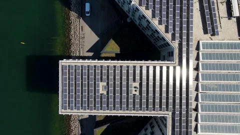 Aerial view of solar panels on a building roof in Copenhagen, Denmark. Stock Footage 345421802