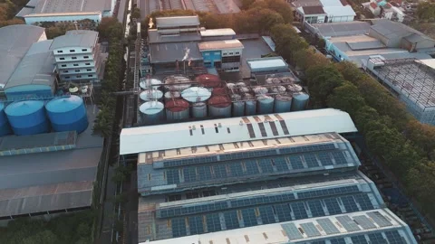 Aerial view of solar panels covering industrial rooftops Stock Footage 341801111