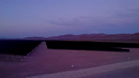 Aerial view of solar panels during sunset in Nevada state. Stock Footage 219890614