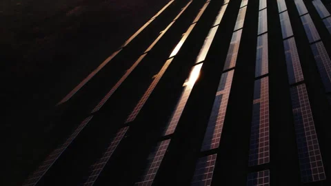 Aerial view of solar panels in the evening at sunset. Colorful sunset Stock Footage 165302589
