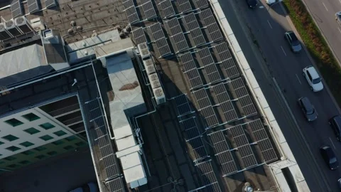 Aerial view of solar panels installed on the roof of a large apartment building Stock Footage 256266290