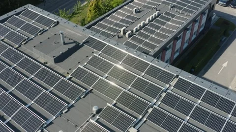 Aerial view, solar panels installed on the roof of an office industrial building Stock Footage 262554527