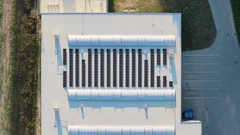 Aerial view of solar panels installing on industrial building roof 스톡 동영상 348073941