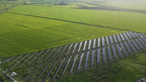 An aerial view of solar panels set amidst a desert Stock Footage 240340033