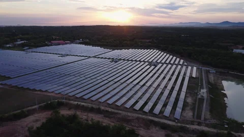 Aerial view of solar panels on sunset sky background. Stock-Footage 246570515