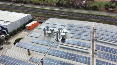 Aerial view of solar panels on warehouse roof Video stock 340503345