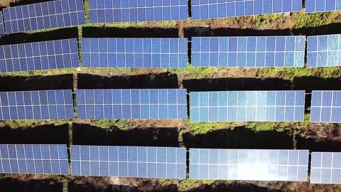 Aerial view of solar power panels in the hill Stock Footage 165448977