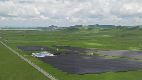 Aerial View of Solar PV Panel Array on Zoige Grassland Mountains Видео 345776676