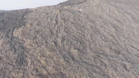 Aerial view of the solidified lava flows of Erta Ale Volcano, Ethiopia. Stock Footage 334153873