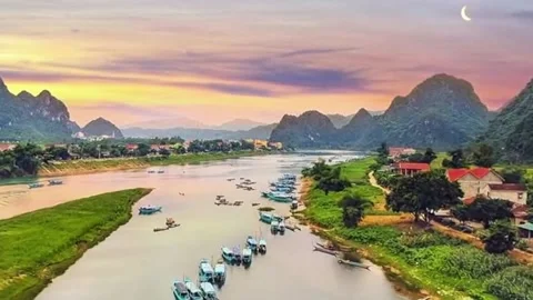 Aerial View of Son River and Limestone Mountains in Phong Nha, Vietnam Stock Footage 332893786