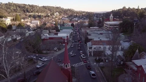 Aerial view of Sonora CA from over top of St. James Episcopal Church Stock Footage 113686037