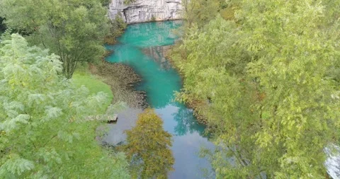 Aerial view of the source of Krupa River, Slovenia Stock Footage 324524306