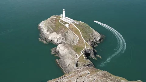 Aerial view of South Stack Lighthouse in Holyhead, United Kingdom. Stock Footage 337334535