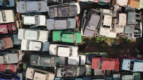 Aerial view of the Soviet car dump. 4K shooting from above on piles of rusting Stock Footage 166391576