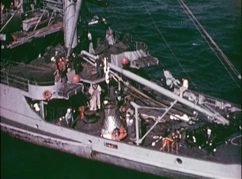 Aerial view of space capsule successfully recovered and onboard Navy ship Stock Footage 262444754