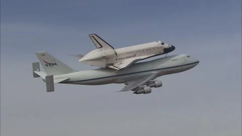 Aerial view of Space Shuttle Atlantis STS-125 ferry flight atop NASA Boeing 737 Stock Footage 283627359