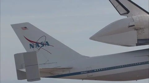 Aerial view of Space Shuttle Atlantis STS-125 ferry flight atop NASA Boeing 737 Stock Footage 283627360