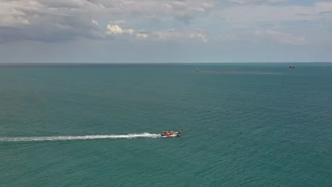 Aerial View of Speed Boat Heading Toward Tropical Island in Thailand Stock Footage 336734741