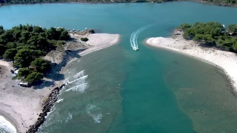 Aerial view of speedboat between two beaches, Glarokavos, Halkidiki Greece Stock-Footage 115454268