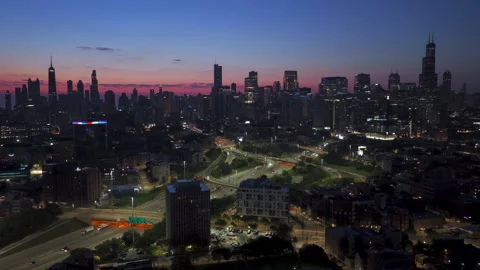 Aerial view of speedy traffic on interchange 90, dusk in River West, Chicago Stock Footage 325328138