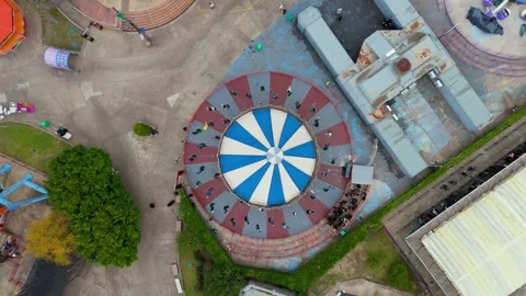 Aerial View of Spinning Circular Ride at Parque de la Costa Amusement Park Vídeo Stock 336440688