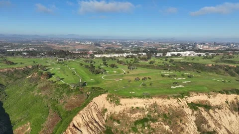 Aerial view spinning left looking at Torrey Pines Golf Course and  Blacks Stock Footage 244909552