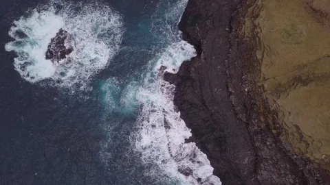 Aerial View Of Splashing Ocean Waves Of Cliff, Faroe Islands, Denmark Stock Footage 116234423