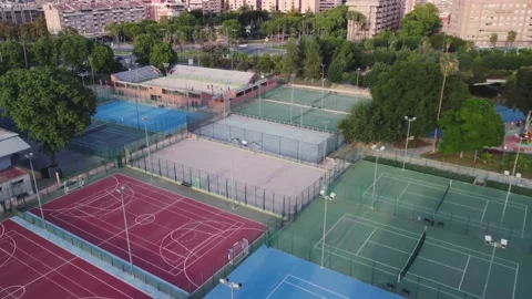 Aerial view of a sports complex, the camera covers the tennis courts, jokey, Stock Footage 218384270