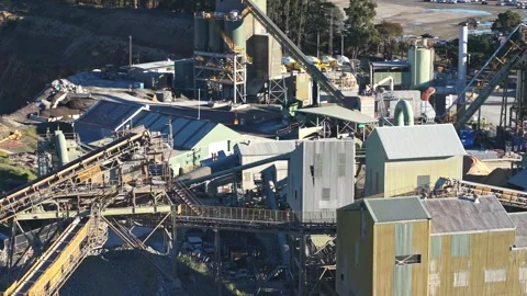 Aerial view of a sprawling stone quarry industrial complex Stock Footage 340123973