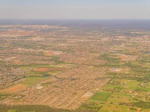 Aerial view of sprawling suburban development and farmland Stock Photos