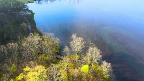 Aerial View of Spring Autumn Dual Color Calm Lake in Shennongjia Hubei China Stock Footage 337939121