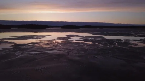 Aerial view of springtime sunset lake Stock Footage 98144476