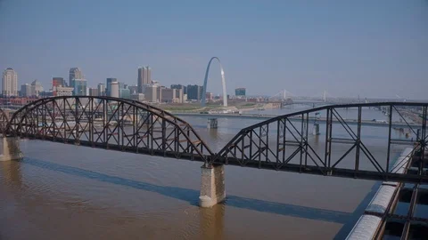 Aerial view of St Louis and bridges over the Mississippi river Stock Footage