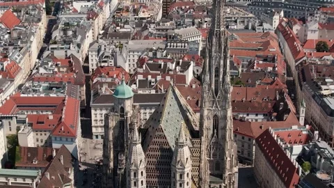 Aerial view of St Stephens Cathedral revealing Vienna cityscape Stock Footage 342719568