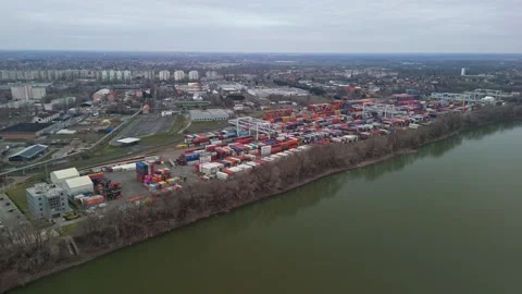 Aerial view of stacked containers at csepel gyártelep by the danube river Stock Footage 336468267