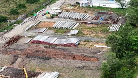Aerial view of stacked piles that serve as foundations for buildings and br.. Stock Footage 333777896