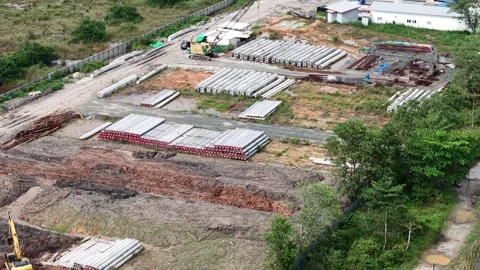 Aerial view of stacked piles that serve as foundations for buildings and br.. Stock Footage 333777933
