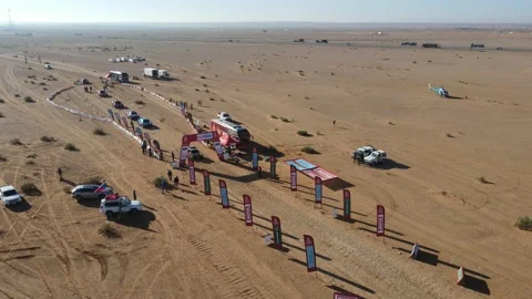 An aerial view of Stage 5 start of the Dakar Rally 2022 Stock Footage 169155732