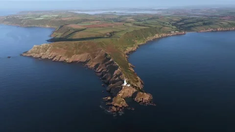 Aerial view of Start Point and lighthouse, Devon, England Stock Footage 251581471